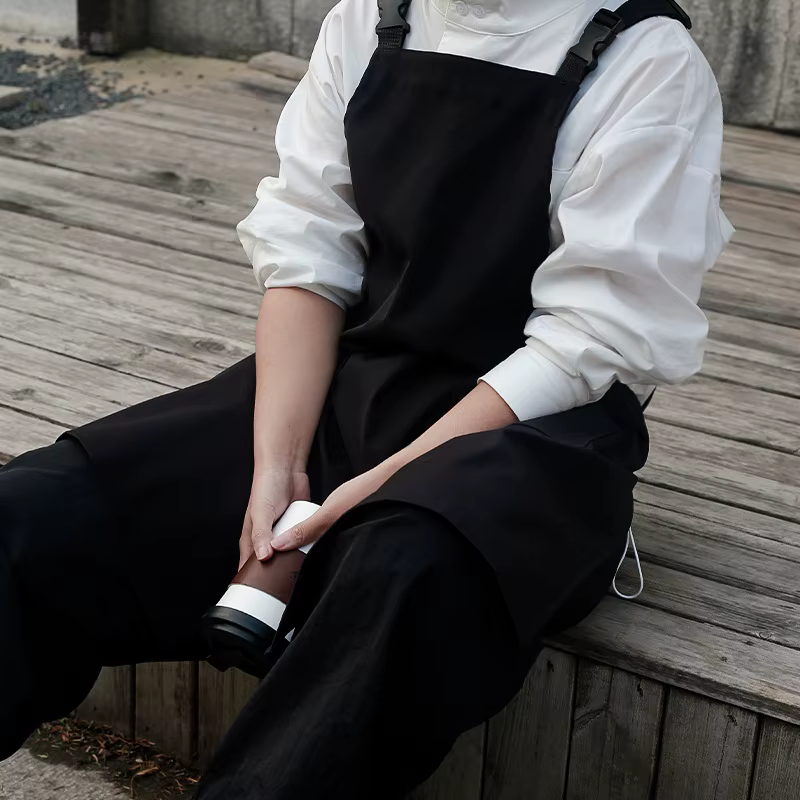 Tablier de logo personnalisé avec le coton imperméable de toile de conception divisée pour la cuisin