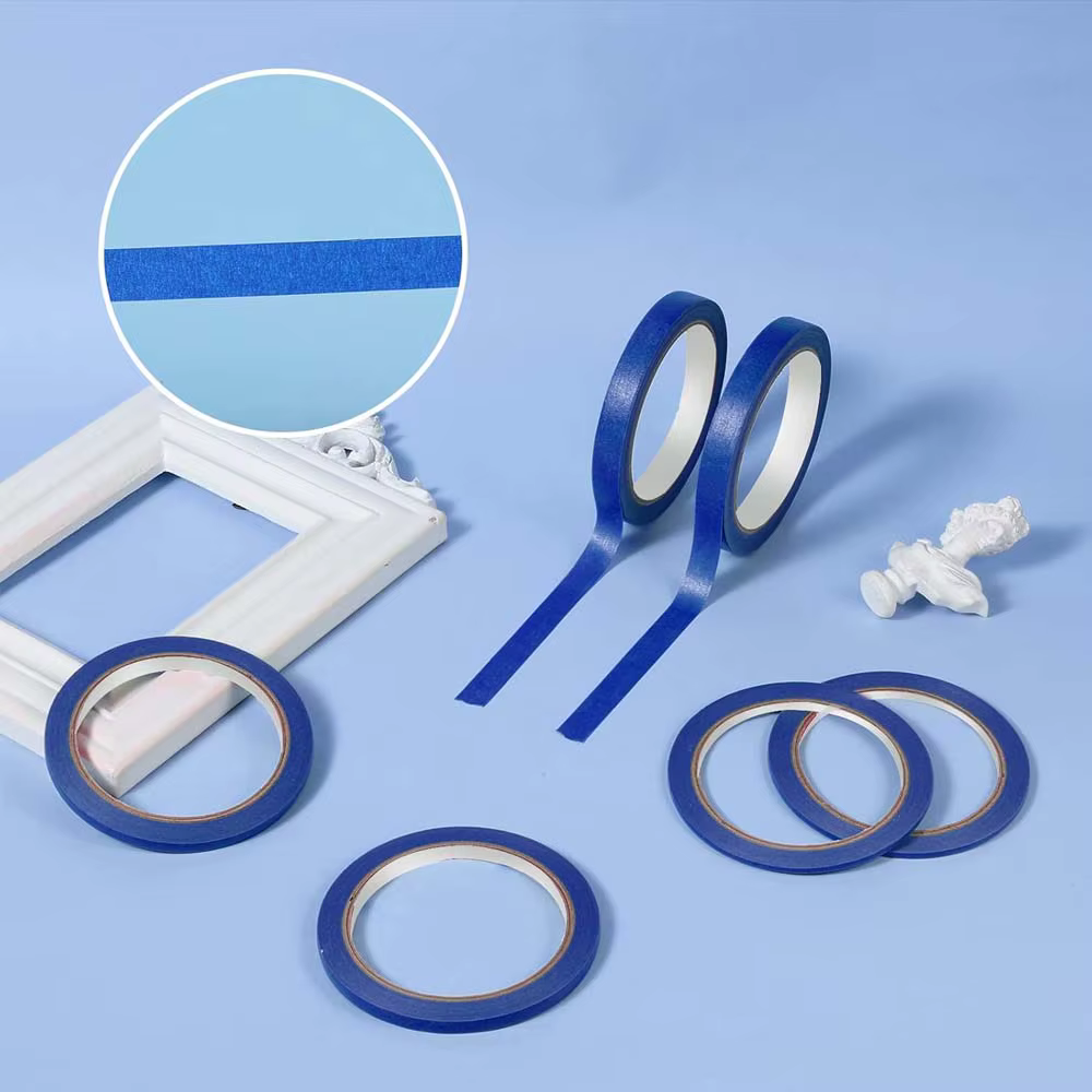 3 rouleaux de ruban bleu