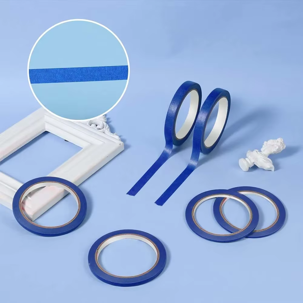3 rouleaux de ruban bleu
