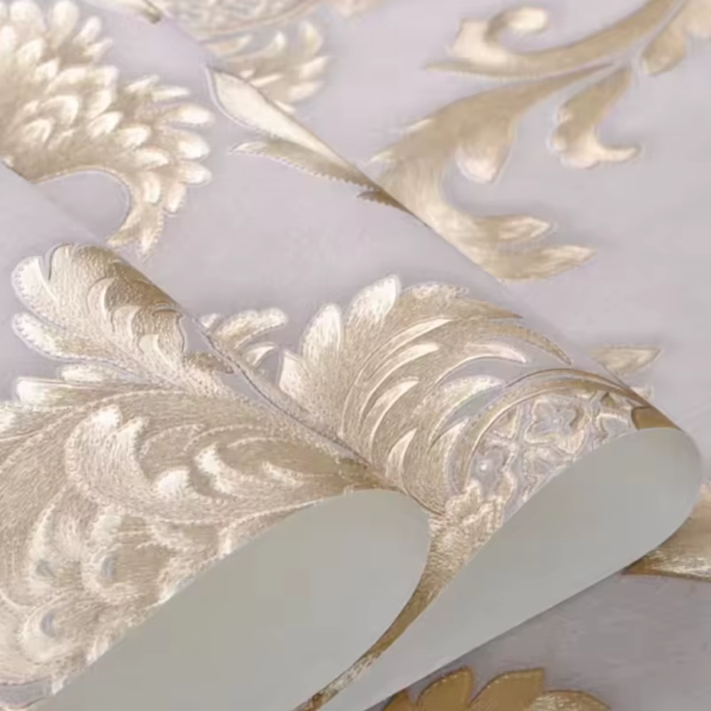 1 rouleau de papier peint doré de 53cm de large