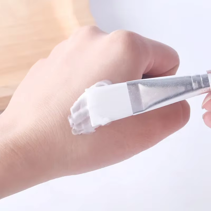 Brosse à masque à poignée transparente