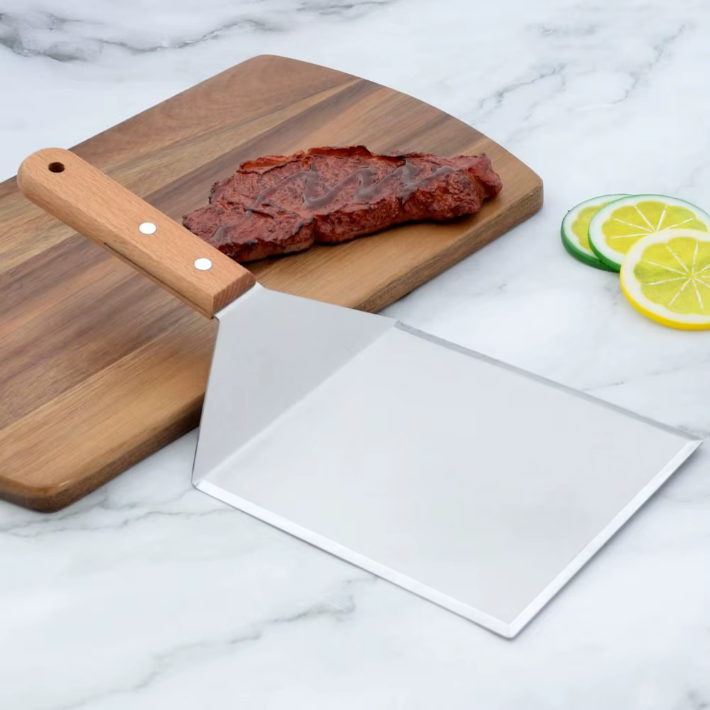 Spatule à tête carrée ou rectangulaire avec lame