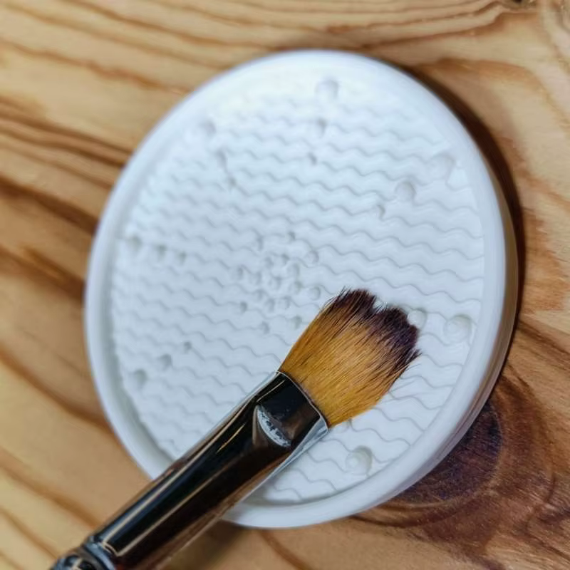 Tampon de nettoyage pour pinceaux